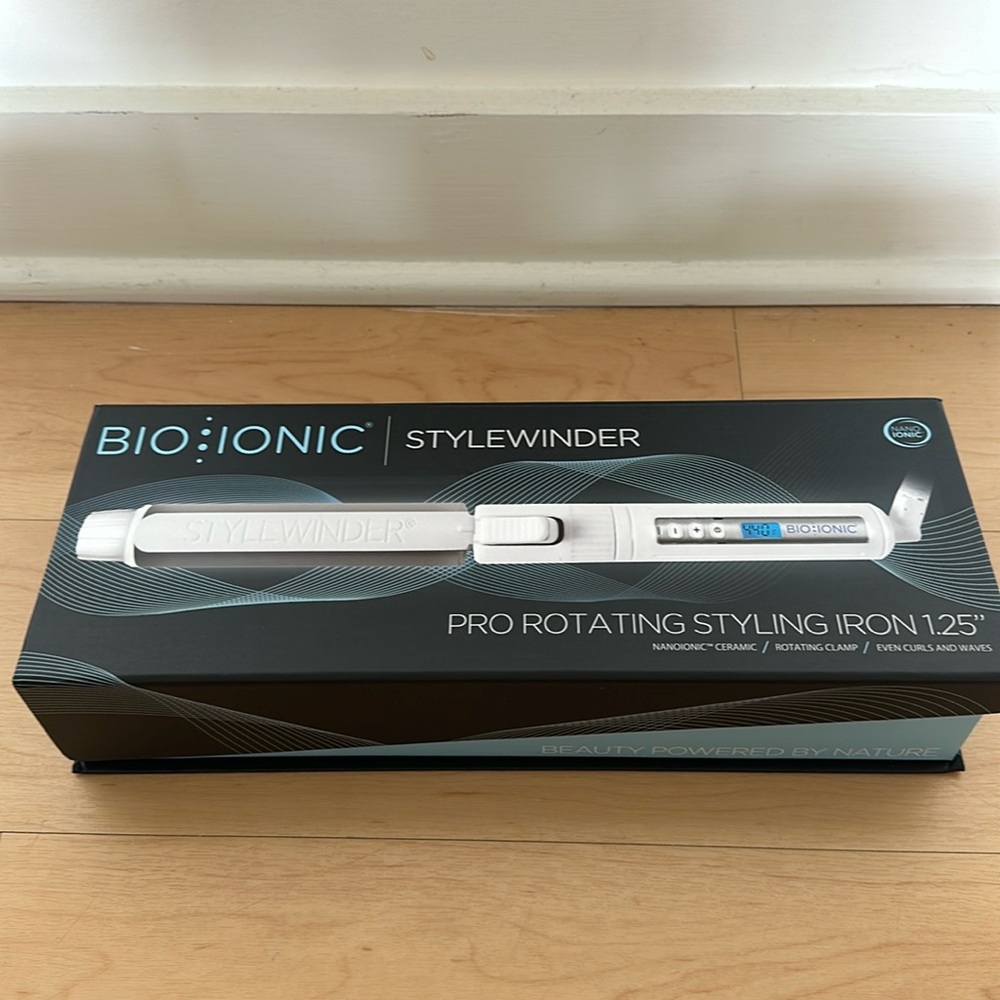 Rotating curling iron